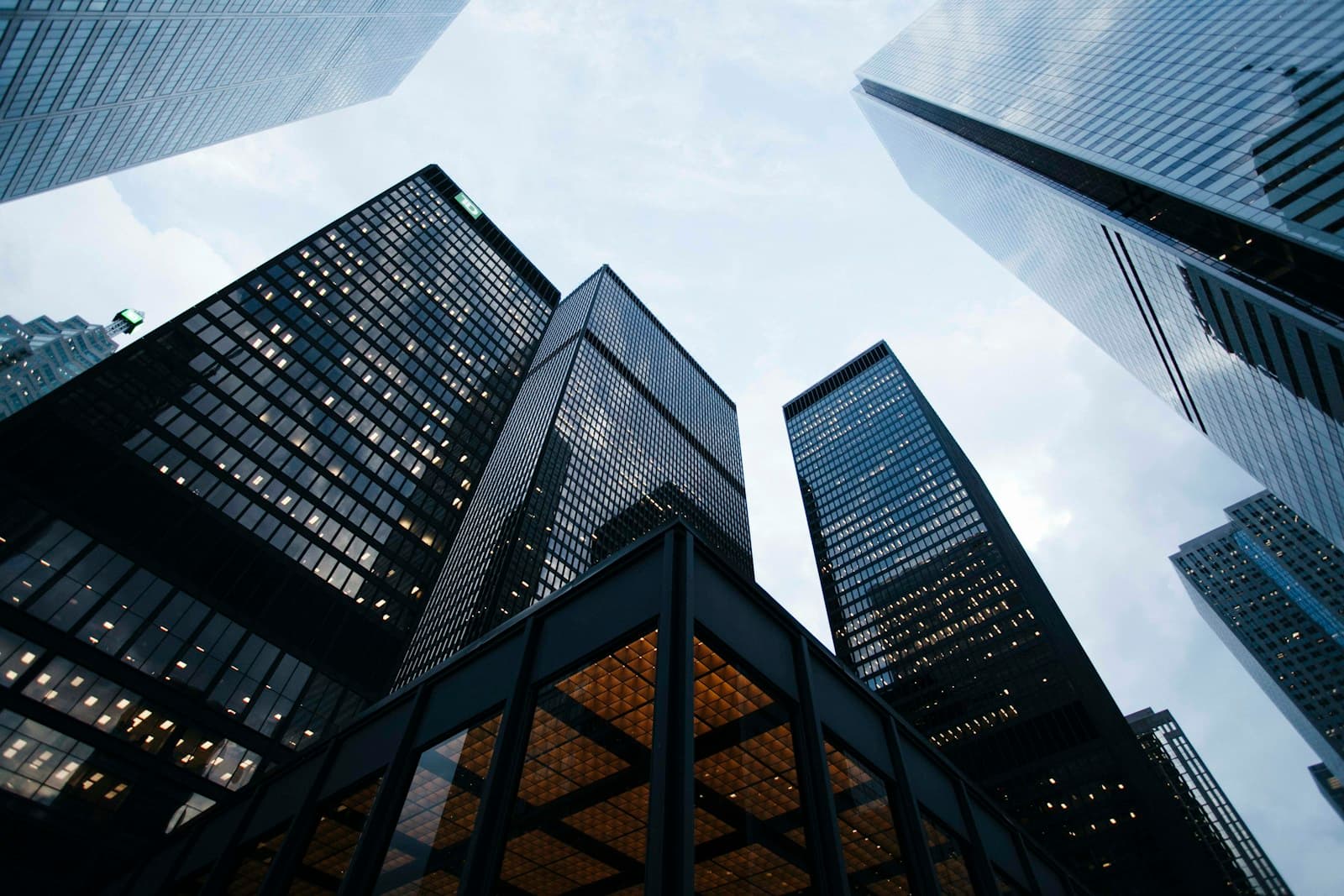Glass-facade skyscrapers representing enterprise scale (photo on Unsplash)
