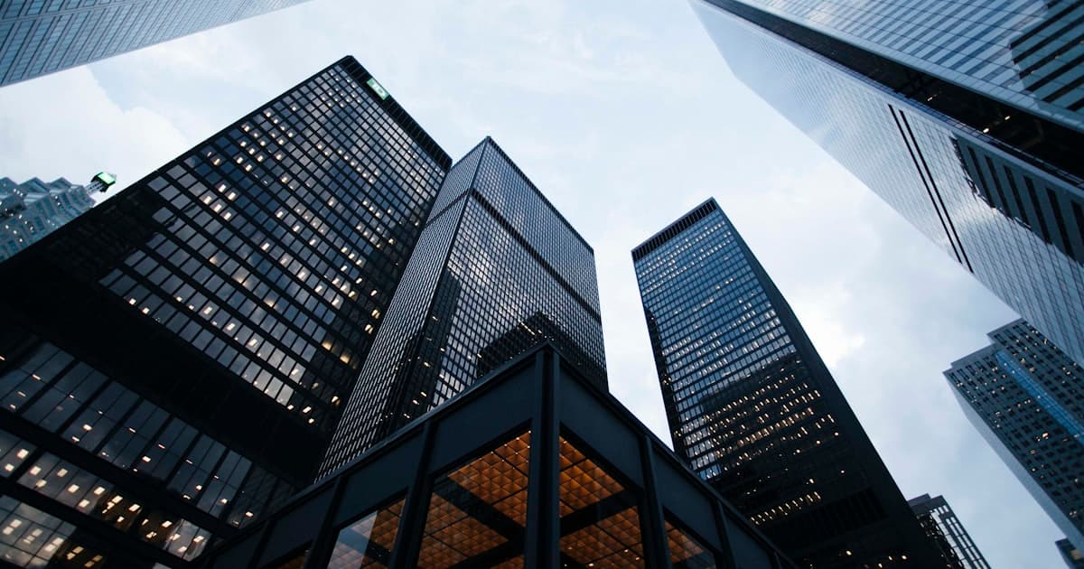 Built environment image used here to suggest enterprise structure, interdependence, and the business layer beneath later architecture choices