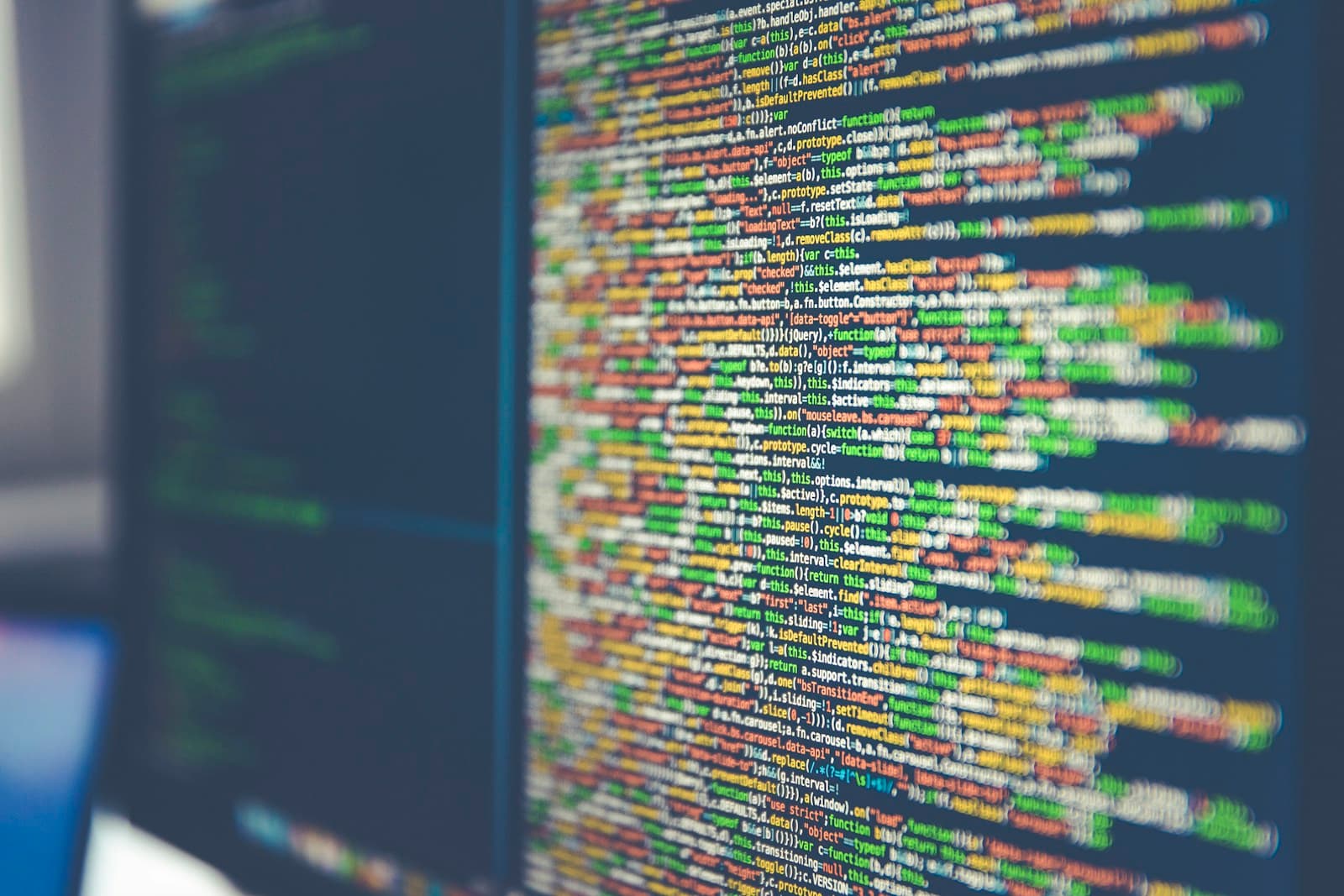 Overhead view of server infrastructure and network cables representing deployment environments (photo on Unsplash)