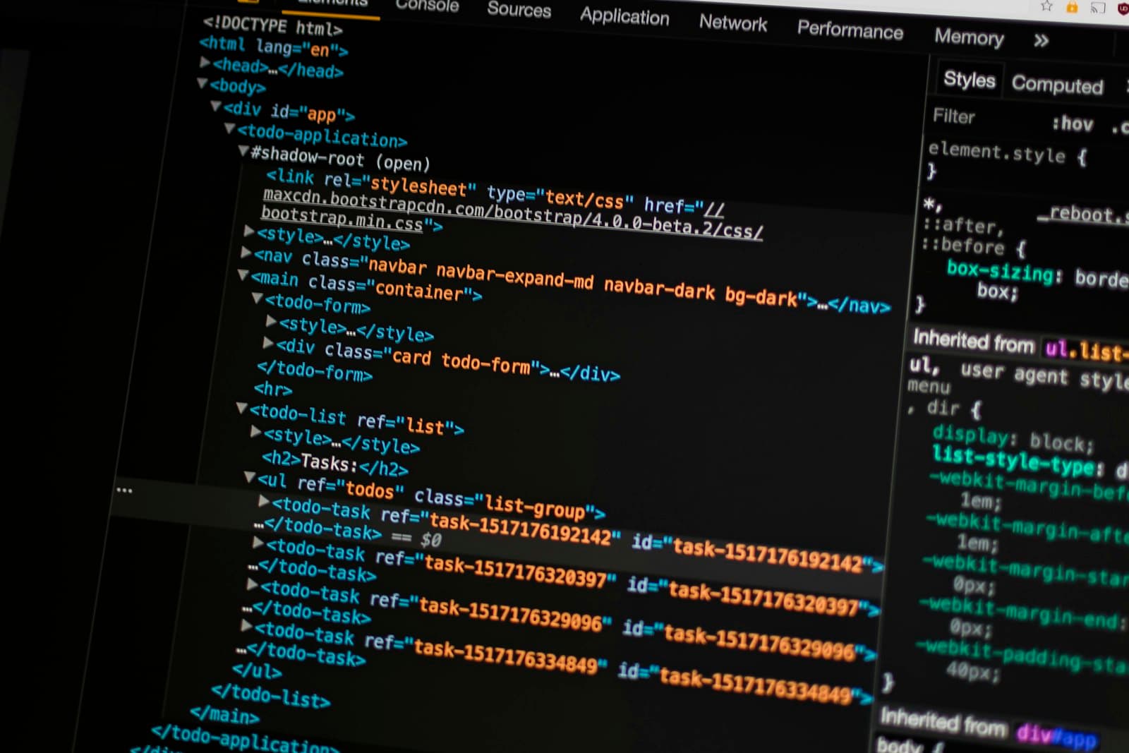 Multiple monitors showing code editor windows alongside an architecture view of the running system.