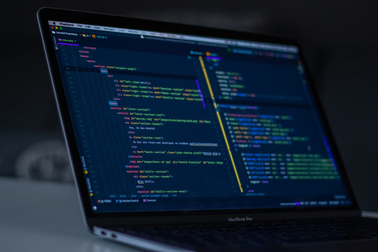 Code editor window with syntax-highlighted source on a dark theme, representative of in-browser developer sandboxes.
